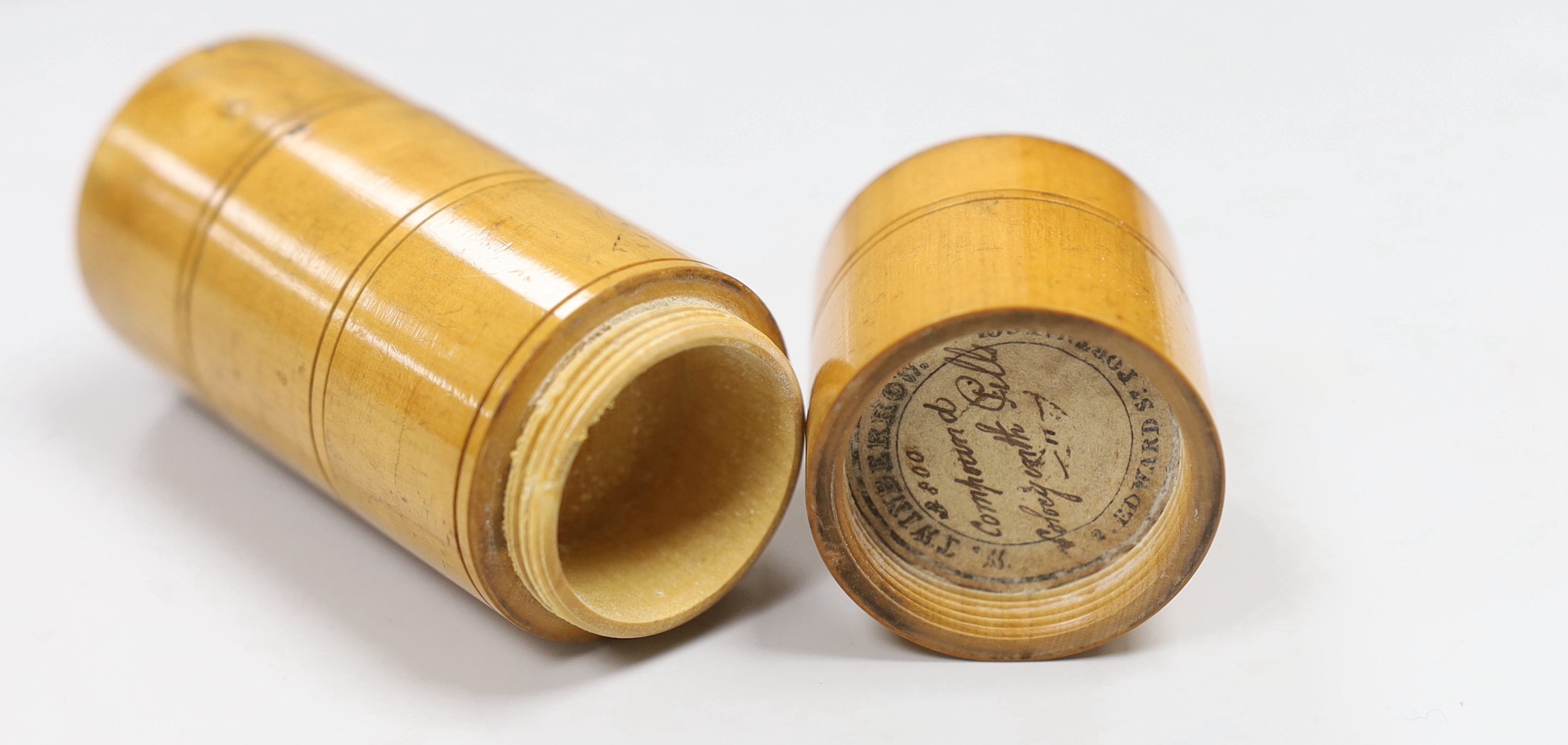 A treen apothecary pill tower, each compartment with ink inscribed labels to the interior, 10cm high